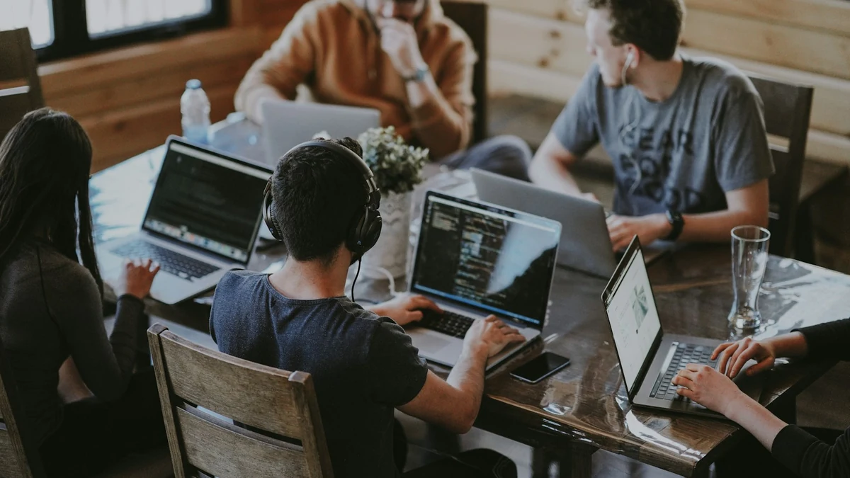 Software engineering agency team collaborating on AI automation workflows
